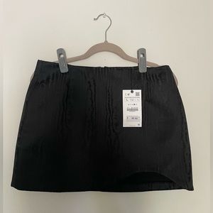 ZARA Mini Skirt size L - Black with a very slight pattern when light hits it 😍